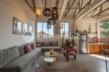Your Polished Base on the Island — Turnkey Furnished Apartment Offering Comfort, Seclusion, and Effortless Coastal Access