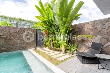 Prestigious 4-Bedroom Canggu Villa with Elegant Enclosed Living Spaces, Luxury Amenities, and Strong Real Estate Investment Opportunity in Bali