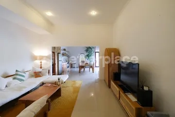 Your Family's Bali Home Awaits: Three Ensuite Bedrooms, Lush Garden and Air-Conditioned Living in Leafy Umalas