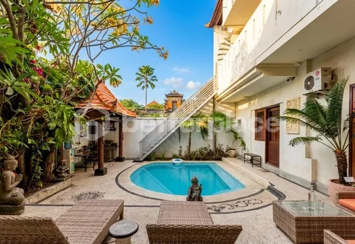 Live Upstairs, Earn Downstairs: Exclusive Property with Turnkey Rental Units and Solar-Powered Infrastructure