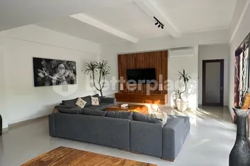 Impressive Six-Bedroom Residence in Seminyak Blending Enclosed Comfort with Open Tropical Elegance